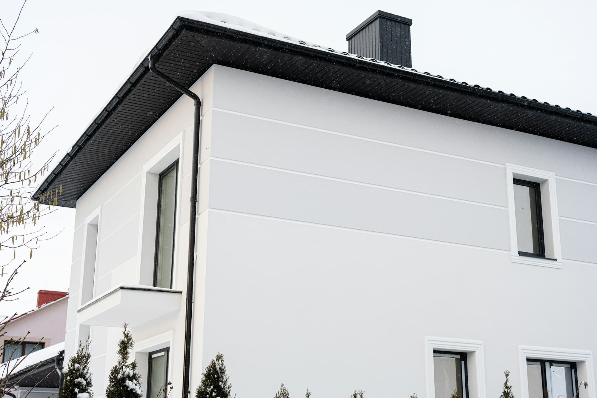 Modern designed white house with big garage, exterior view.